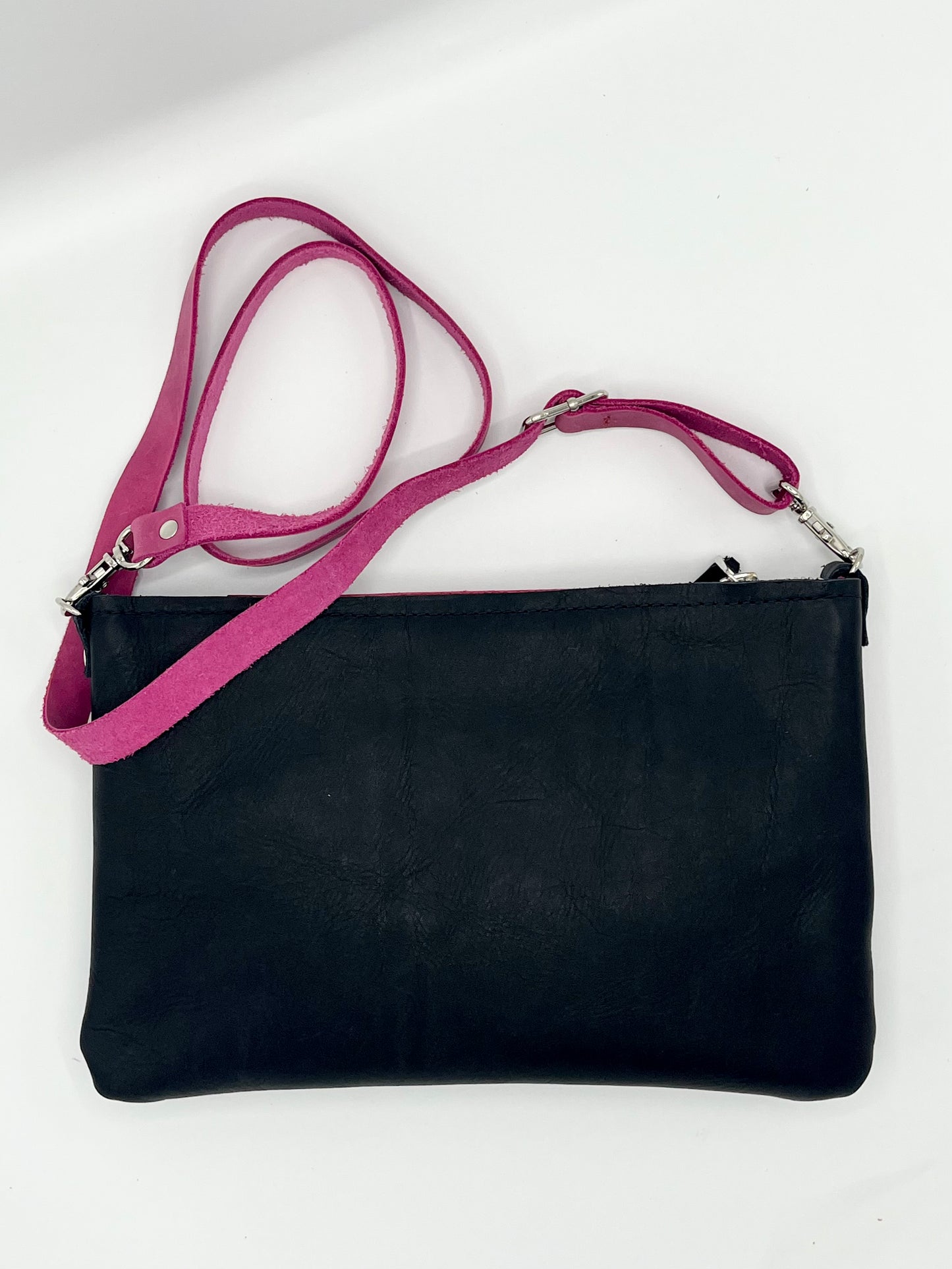 Pink and black clutch deals
